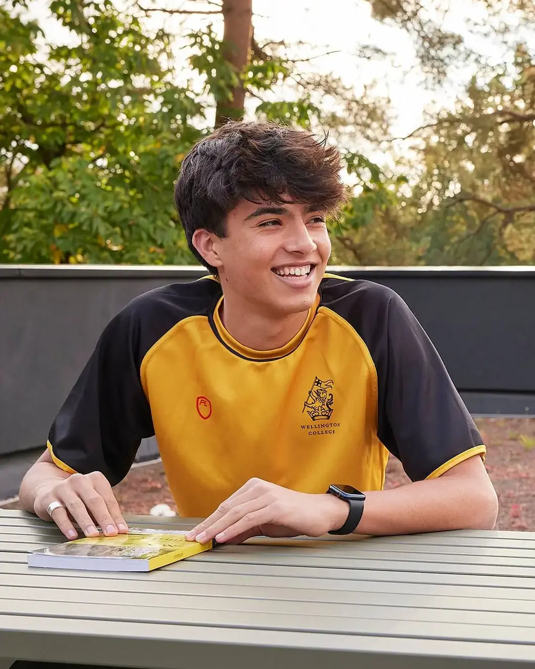 Students smiling and talking outside