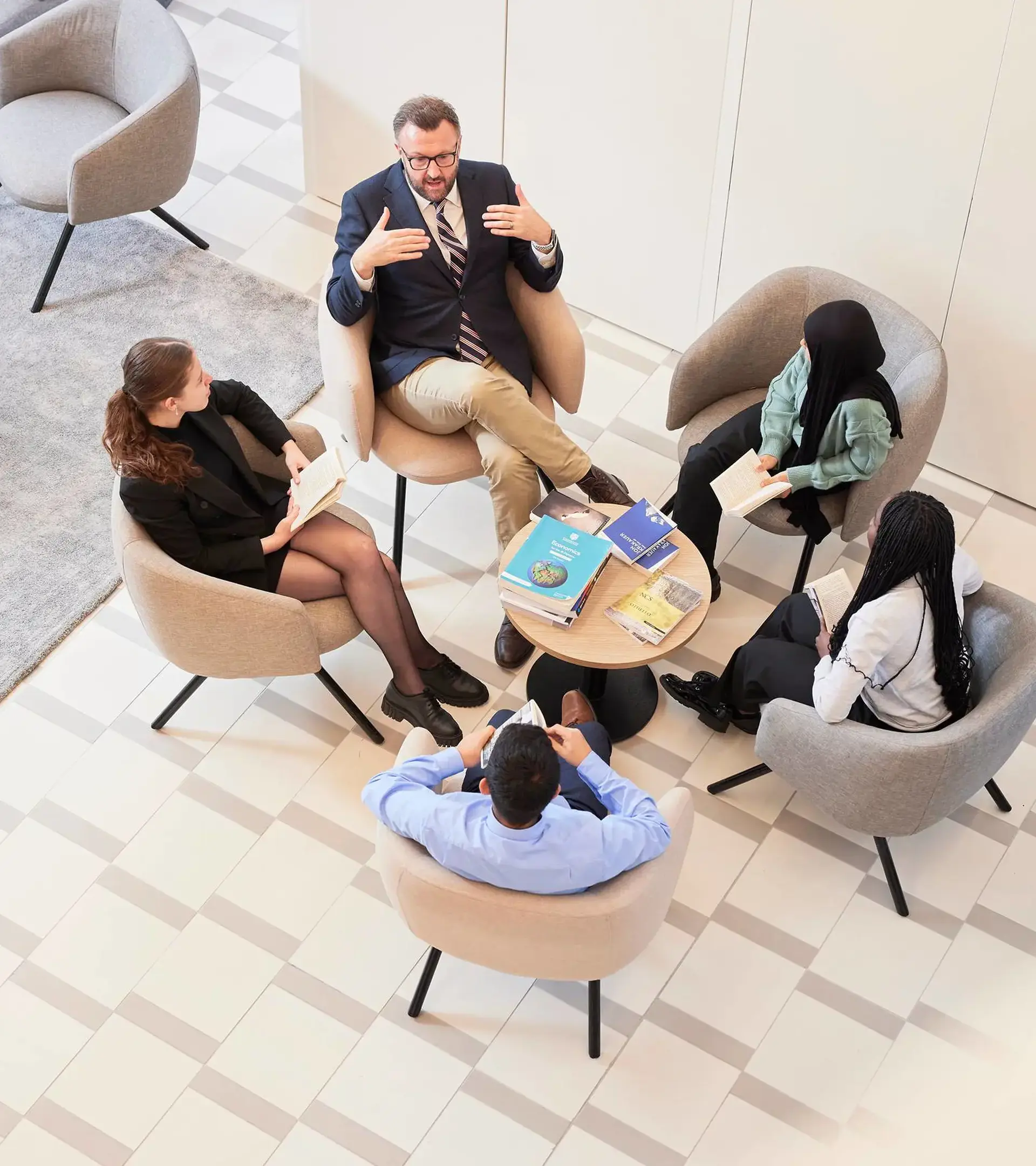 College counselor talking with students