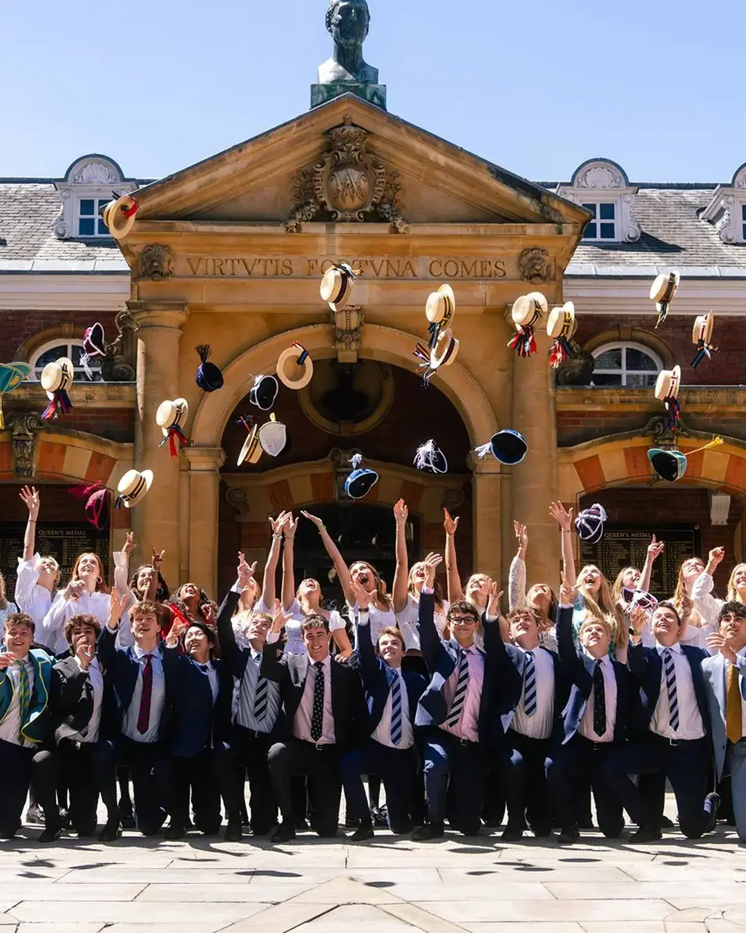 Students celebrating graduation