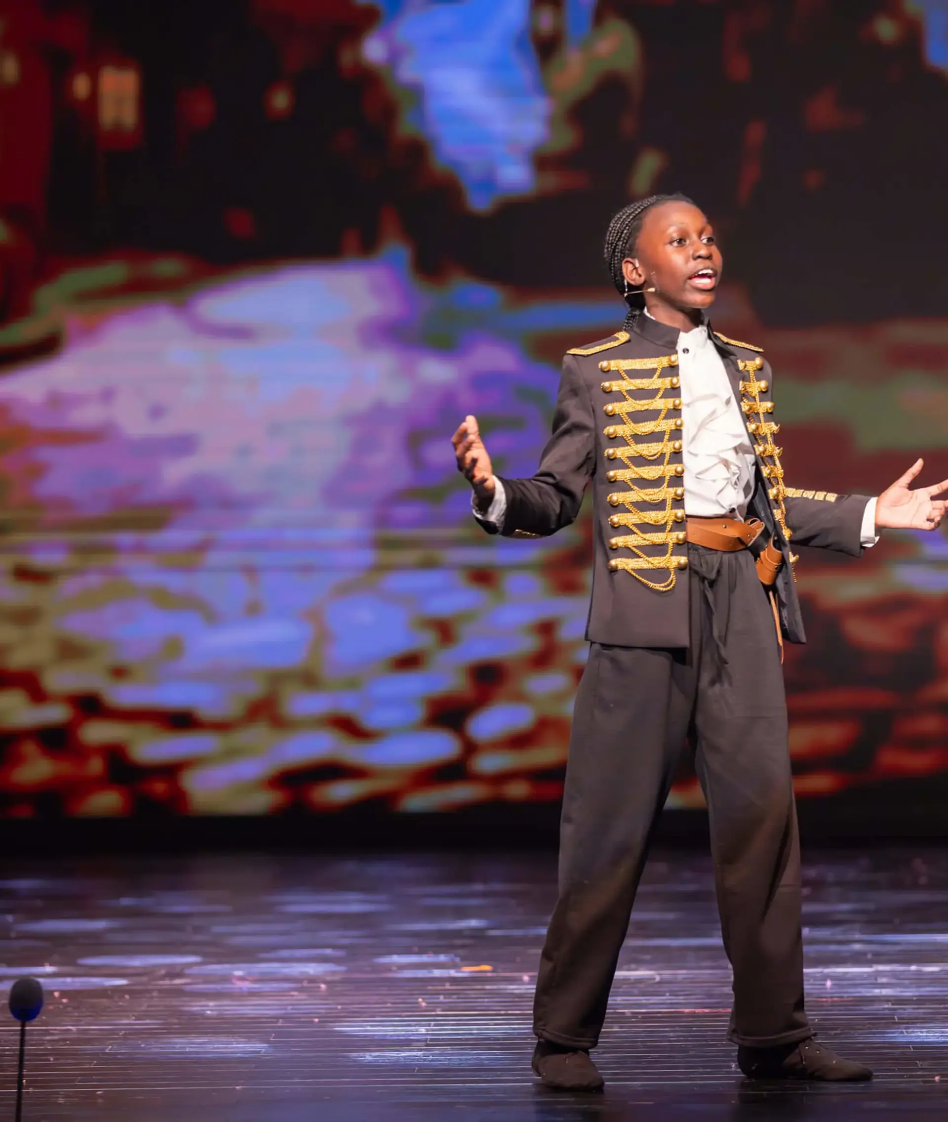 Student performing on stage