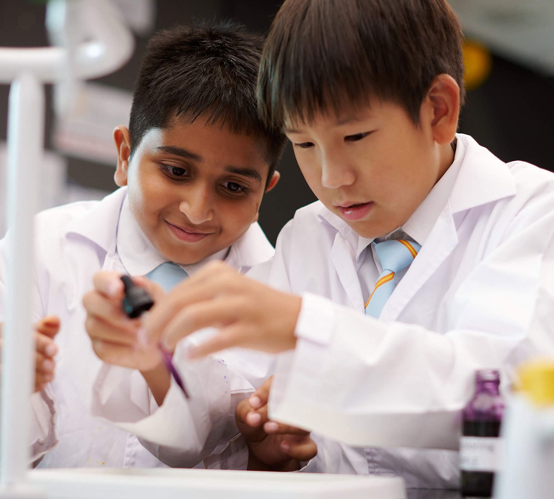 Students in chemistry lesson