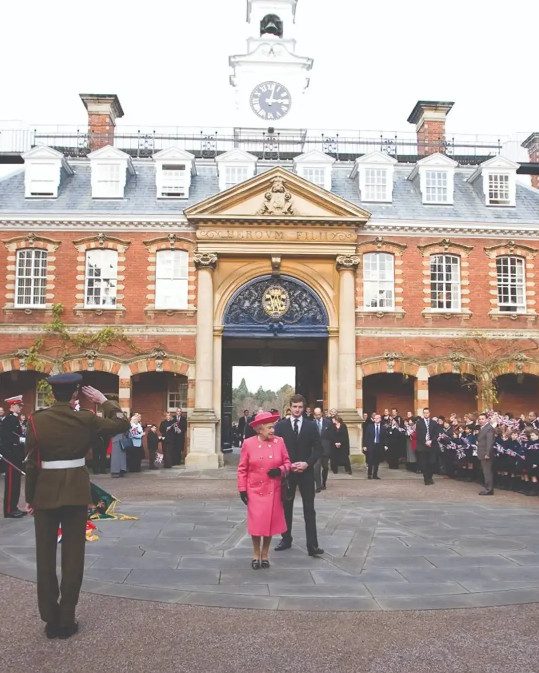 Late queen elizabeth being welcomed by students and staff