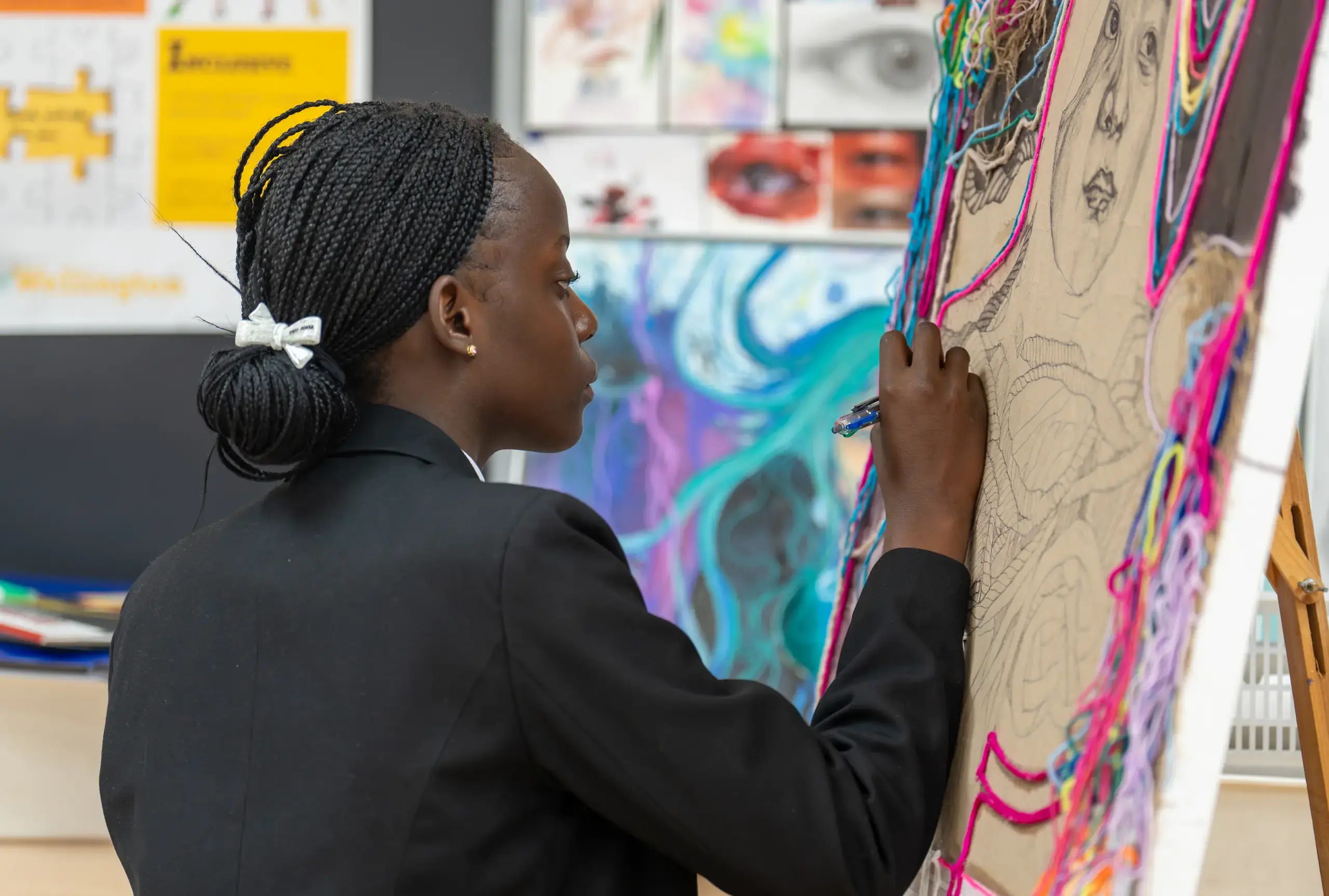 Student creating artwork